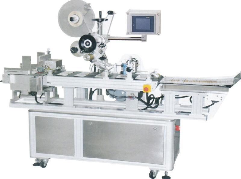 米袋平面貼標機